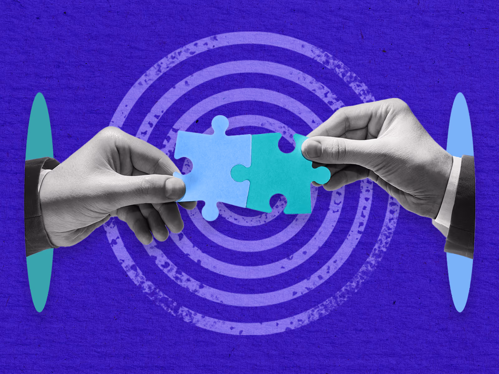 Two hands in suits holding puzzle pieces connecting against a blue target background.