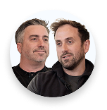 Portrait of two men with short hair and casual dark tops against a white circle background.