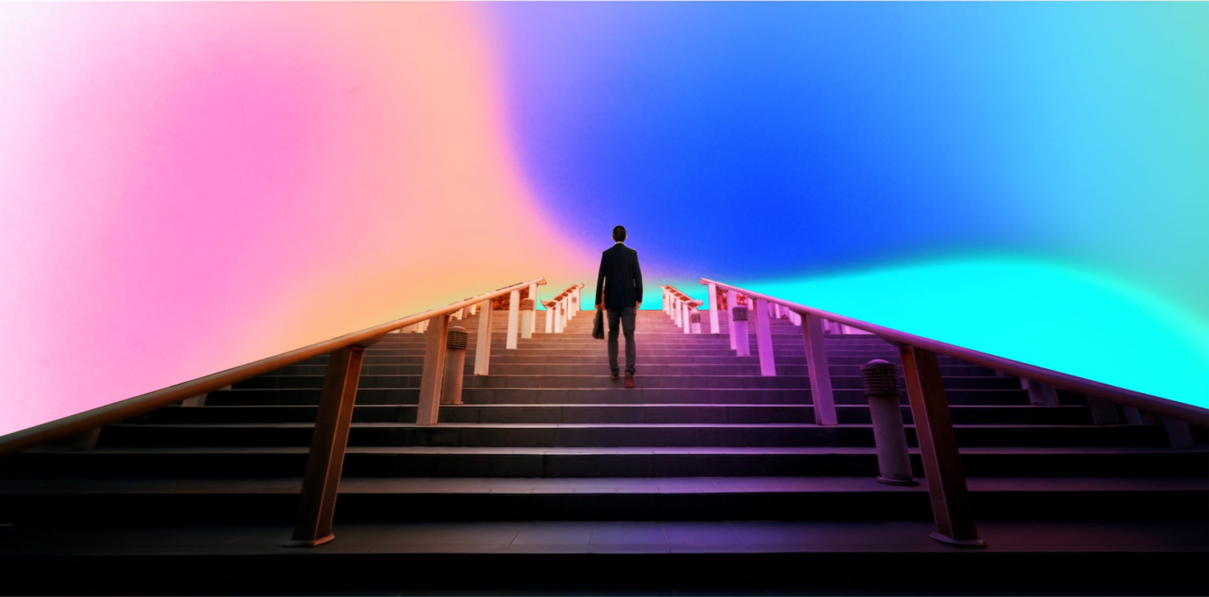 A man in a suit carrying a briefcase walking up a wide staircase with handrails on both sides under a vibrant sky blending pink, orange, blue, and turquoise colours.