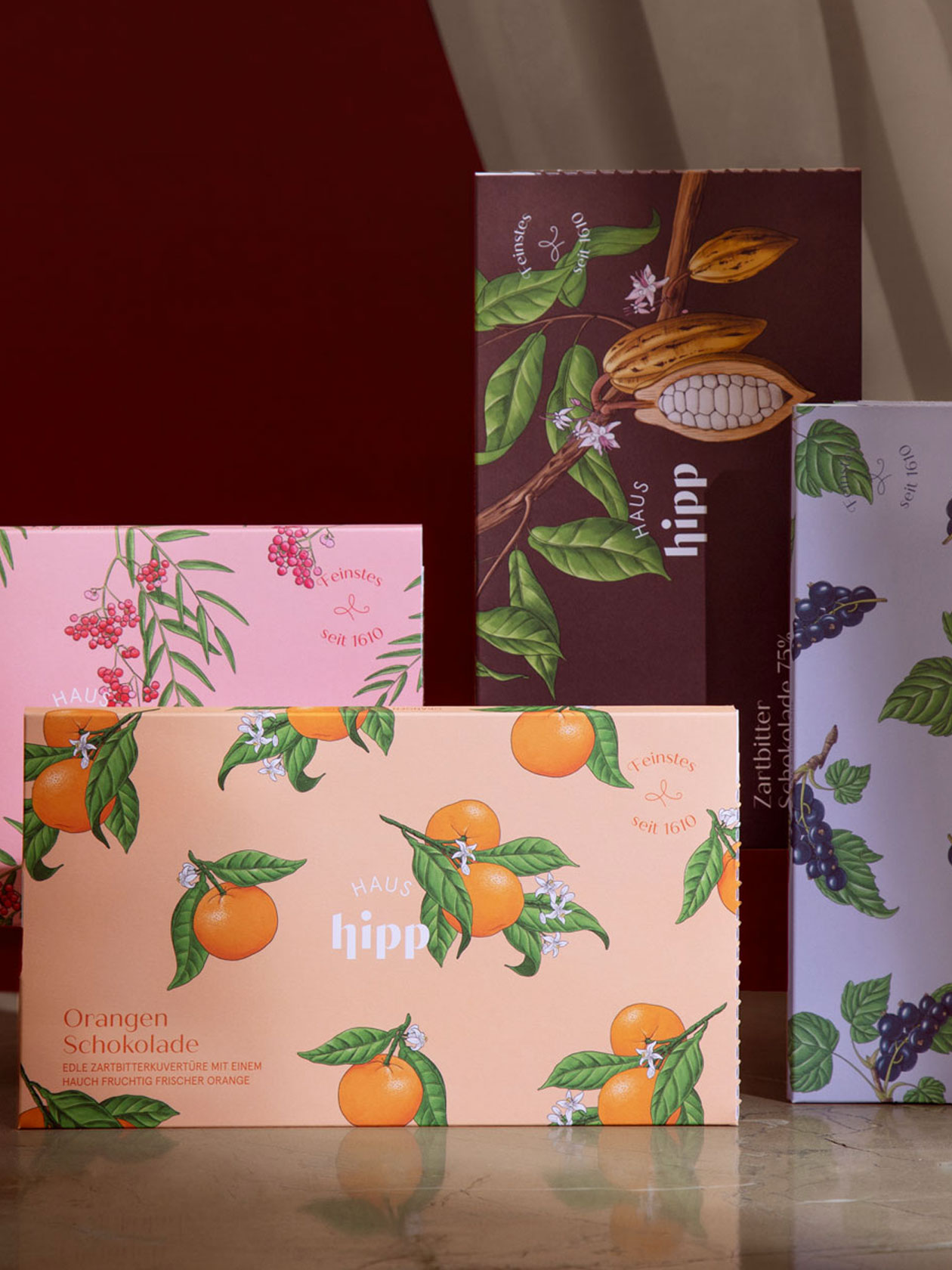 Haus Hipp chocolate packaging with colourful botanical illustrations