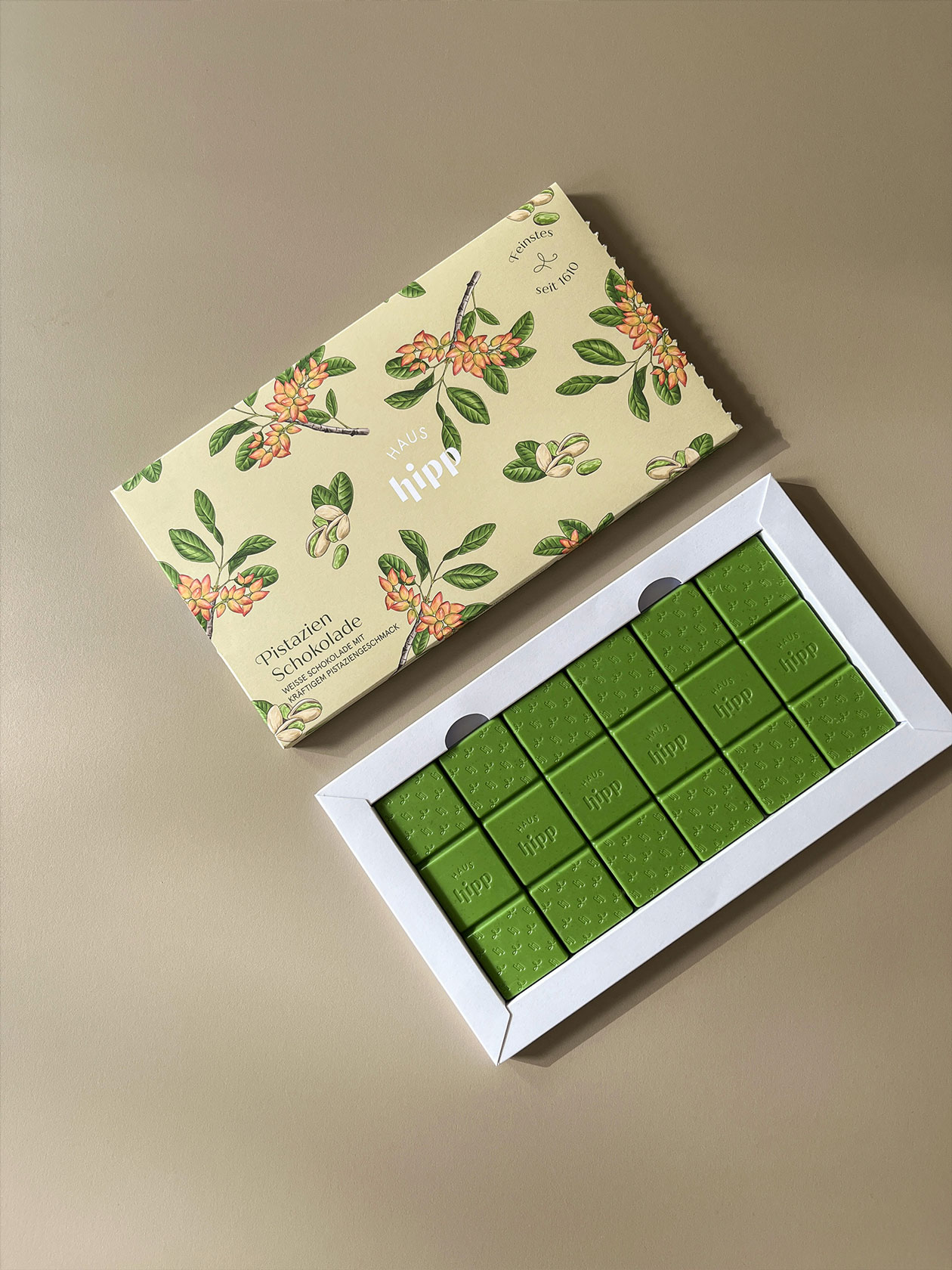 Open Haus Hipp packaging with a green chocolate bar