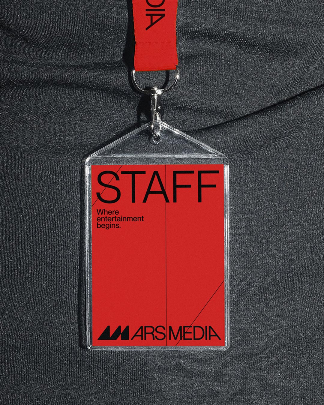 Red Ars Media staff pass on a lanyard