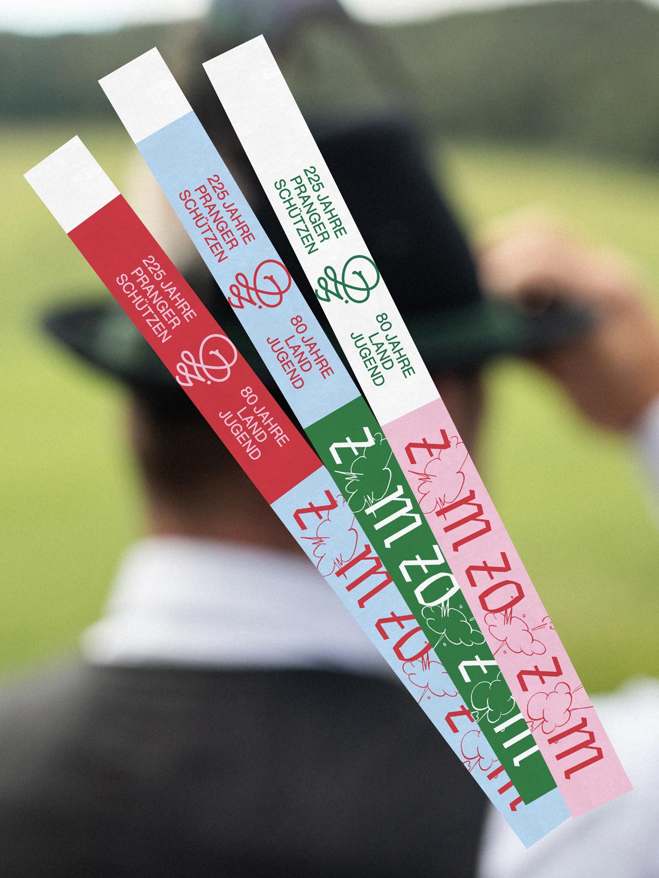 Colourful admission wristbands with Zom Zom Zom lettering