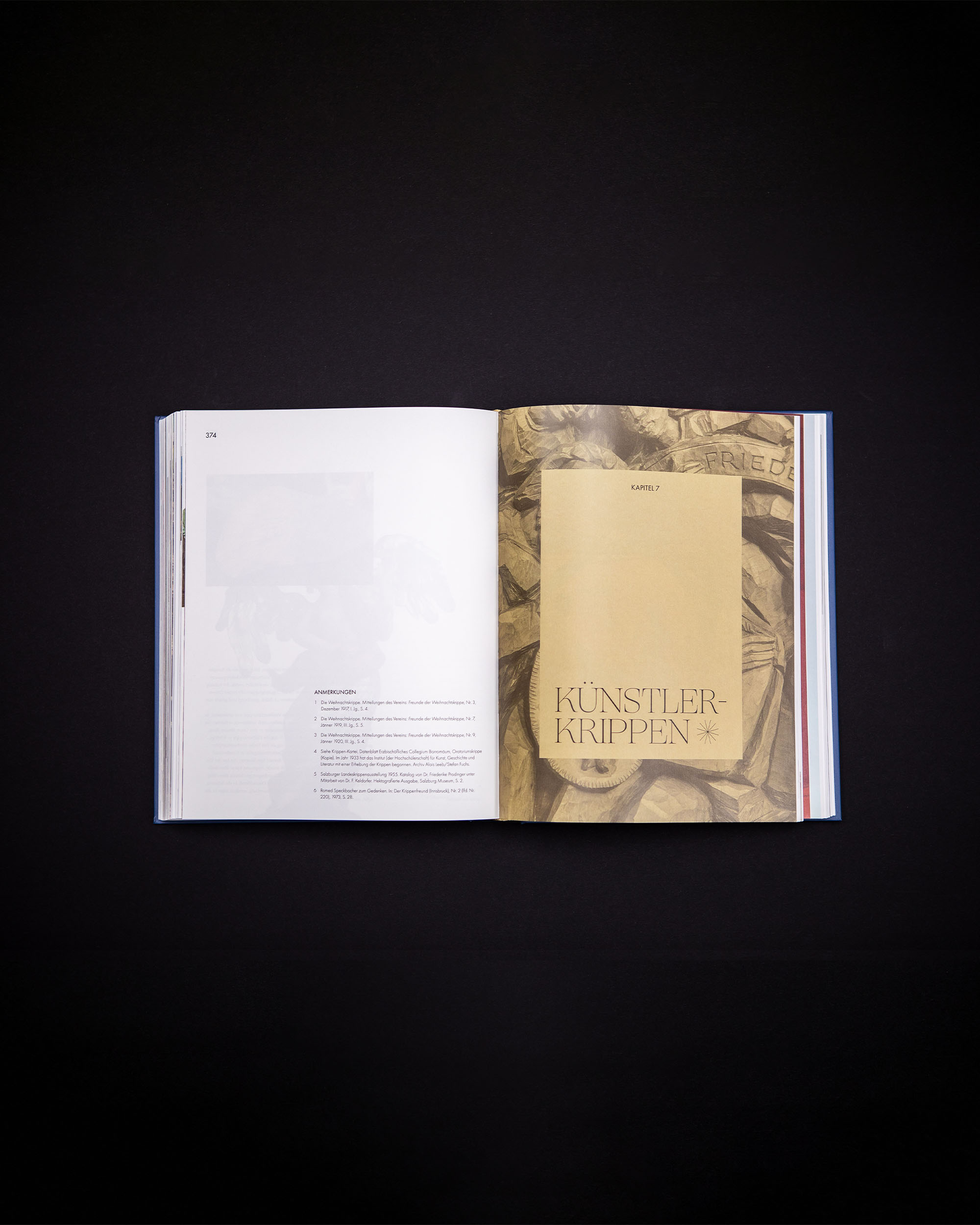 Open book with a chapter opening over a historical image