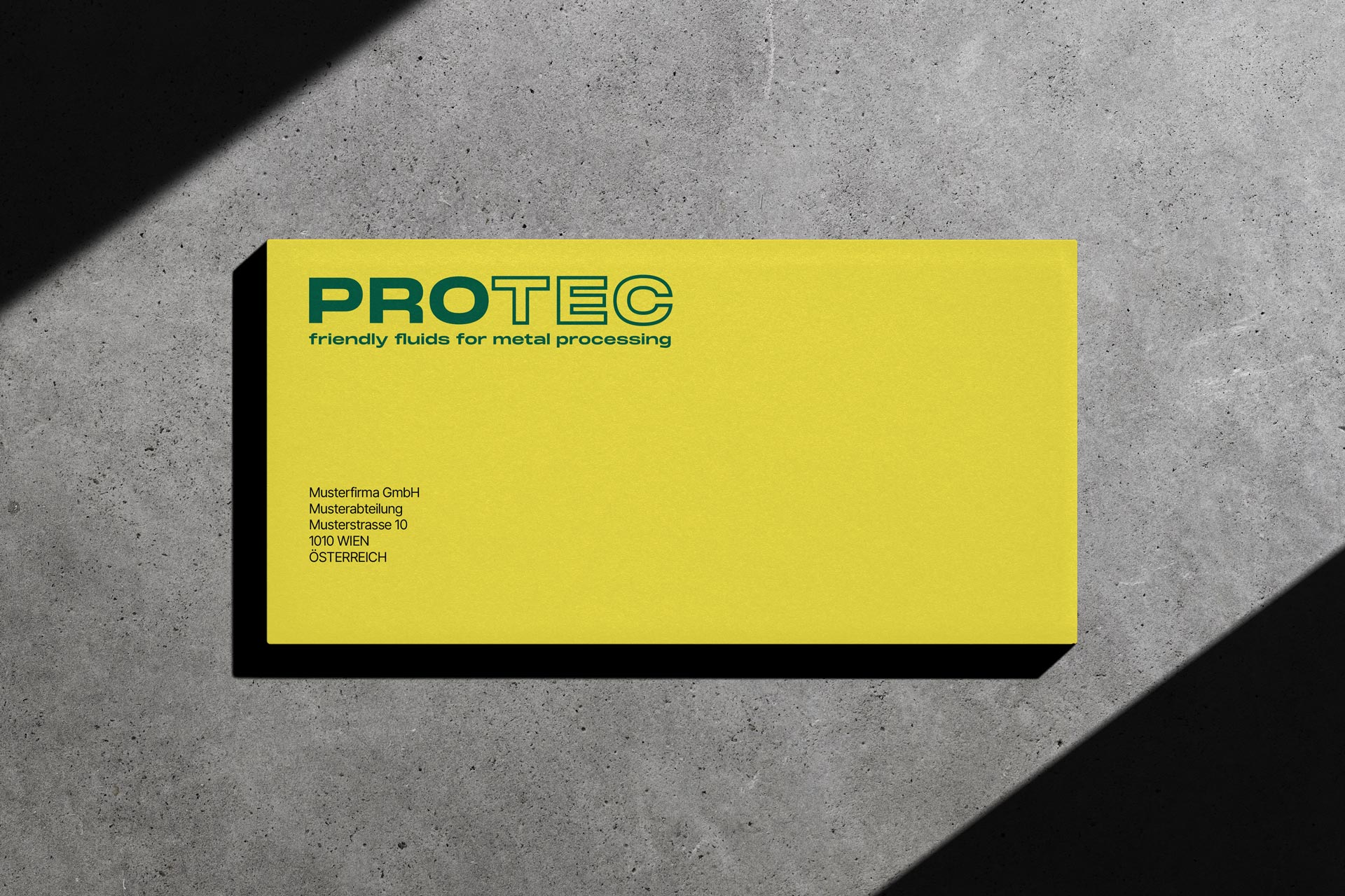 Yellow PROTEC envelope with a green logo