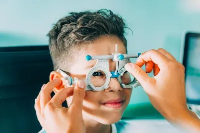 Young boy having an eye test at Aidan Walsh Opticians