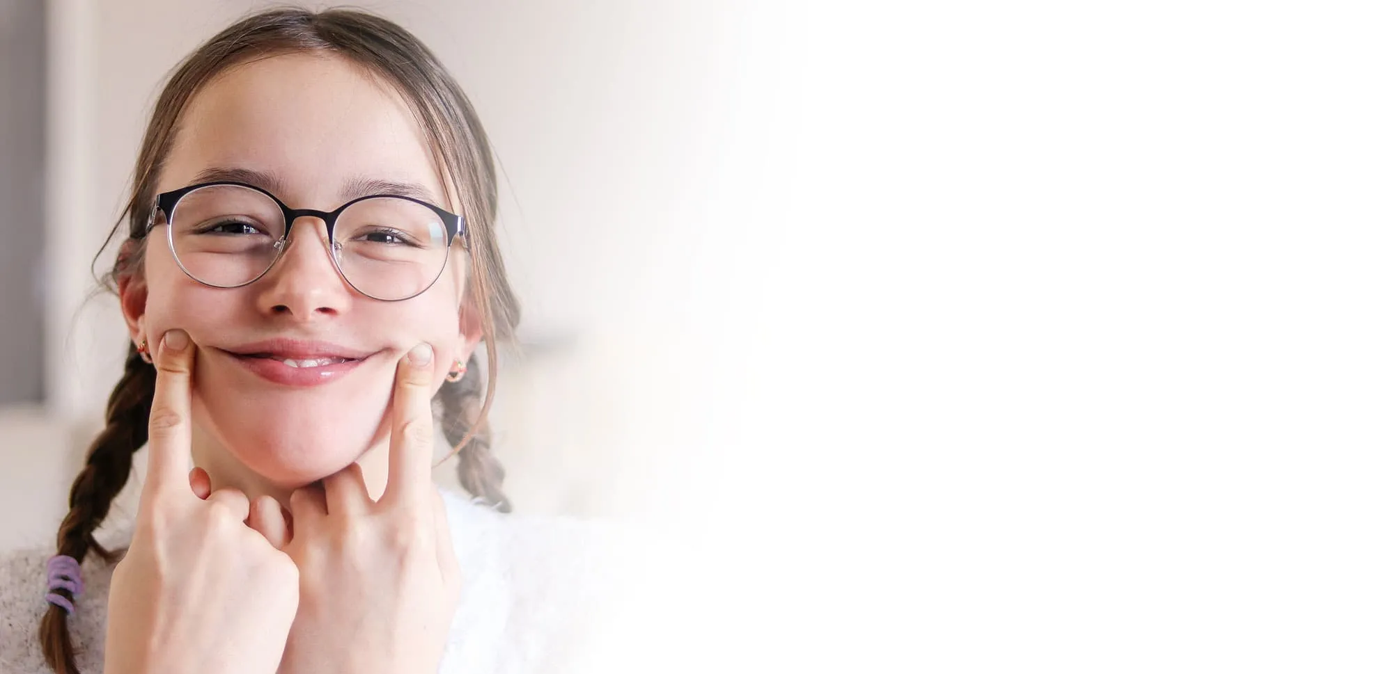 Young child wearing glasses