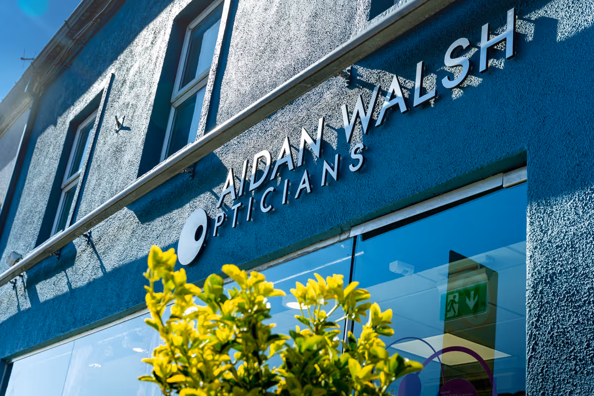 Side view of Aidan Walsh Opticians storefront