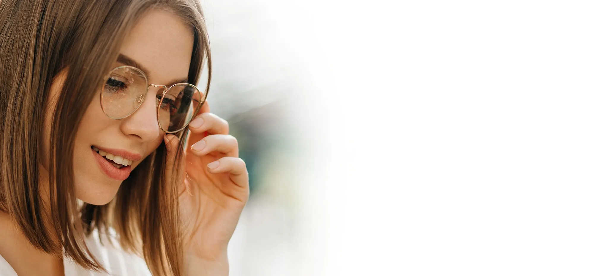 Woman wearing glasses with customised lenses