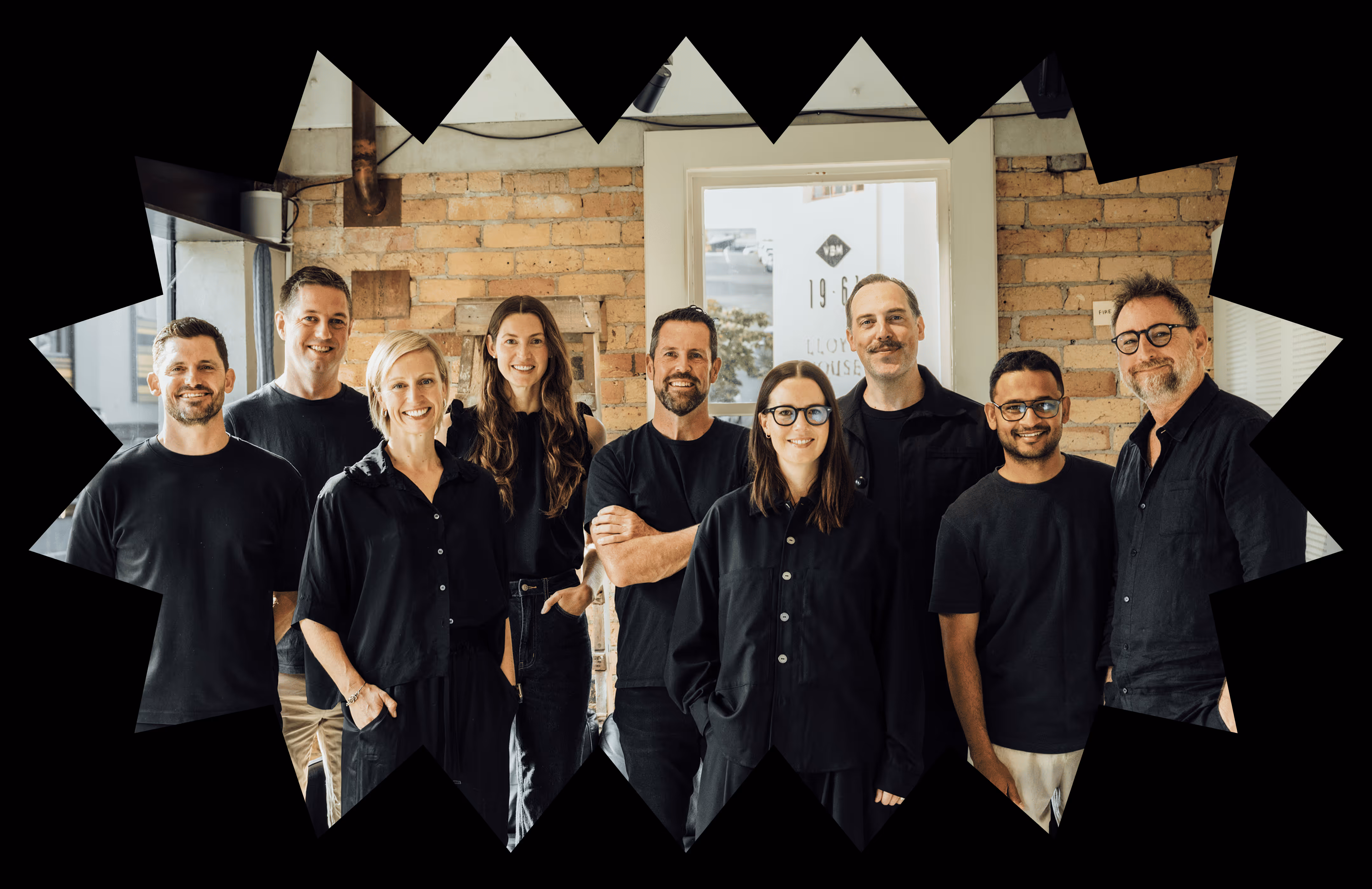 A professional photo of the team at New+Improved