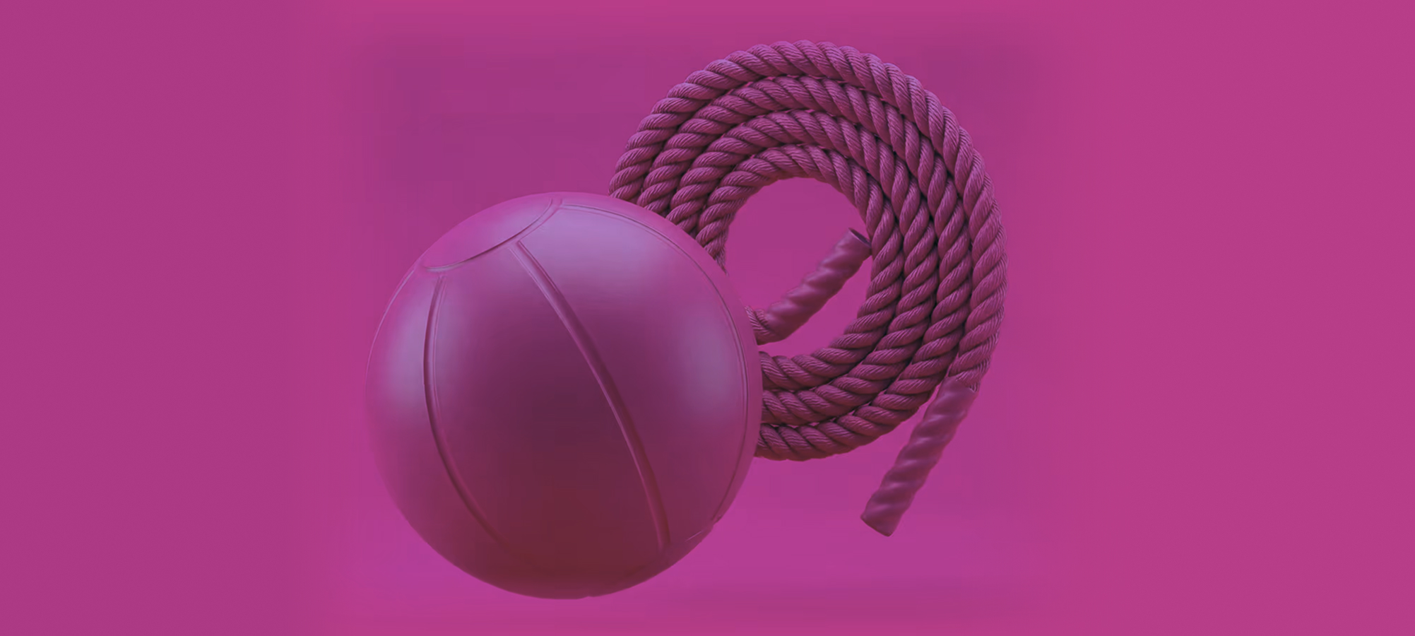 Pink basketball next to a coiled pink rope on a solid pink background.
