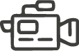 Outline icon of a video camera with lens and handle.