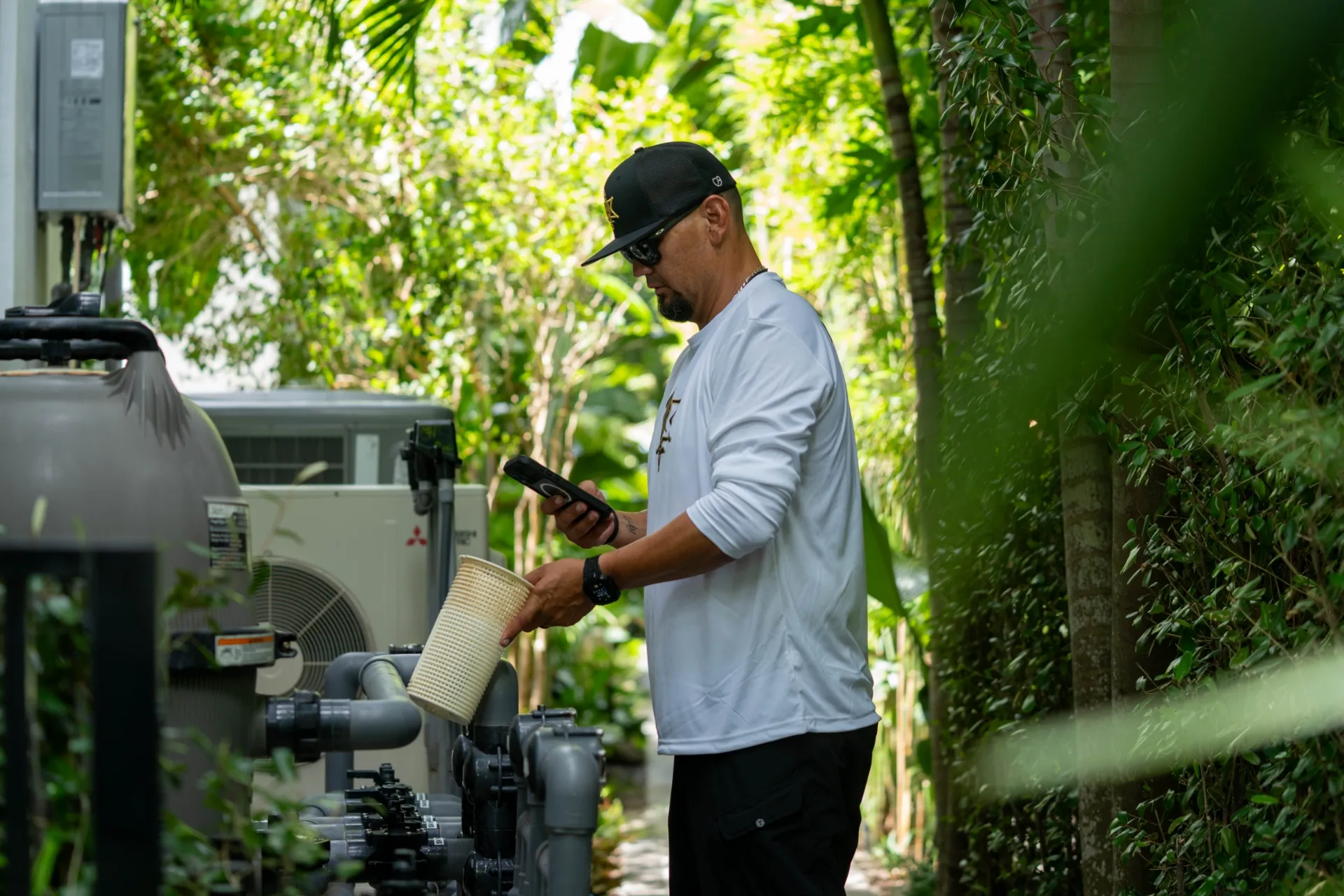 Pool Rangers technician servicing a Miami pool