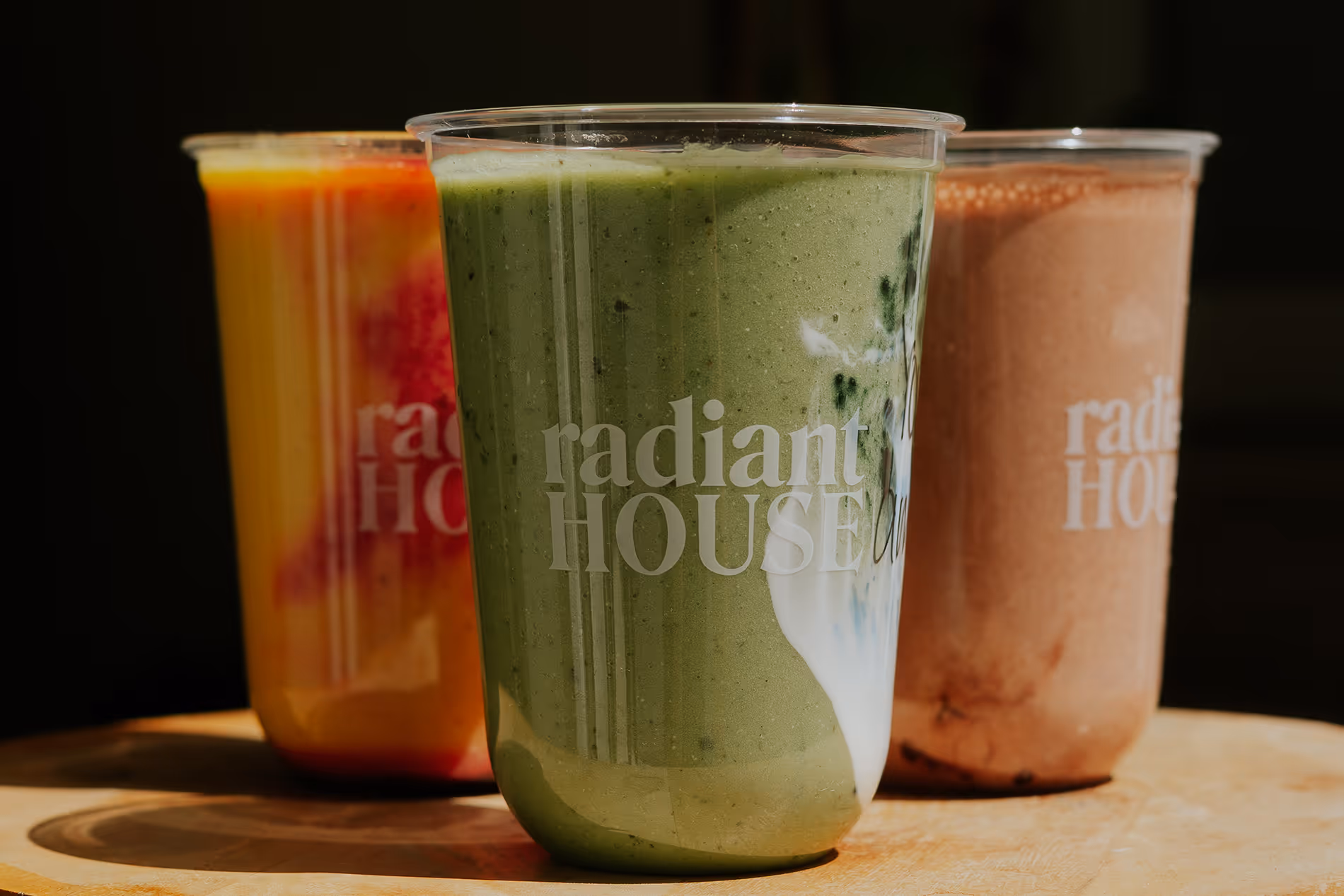 3 smoothies on a table