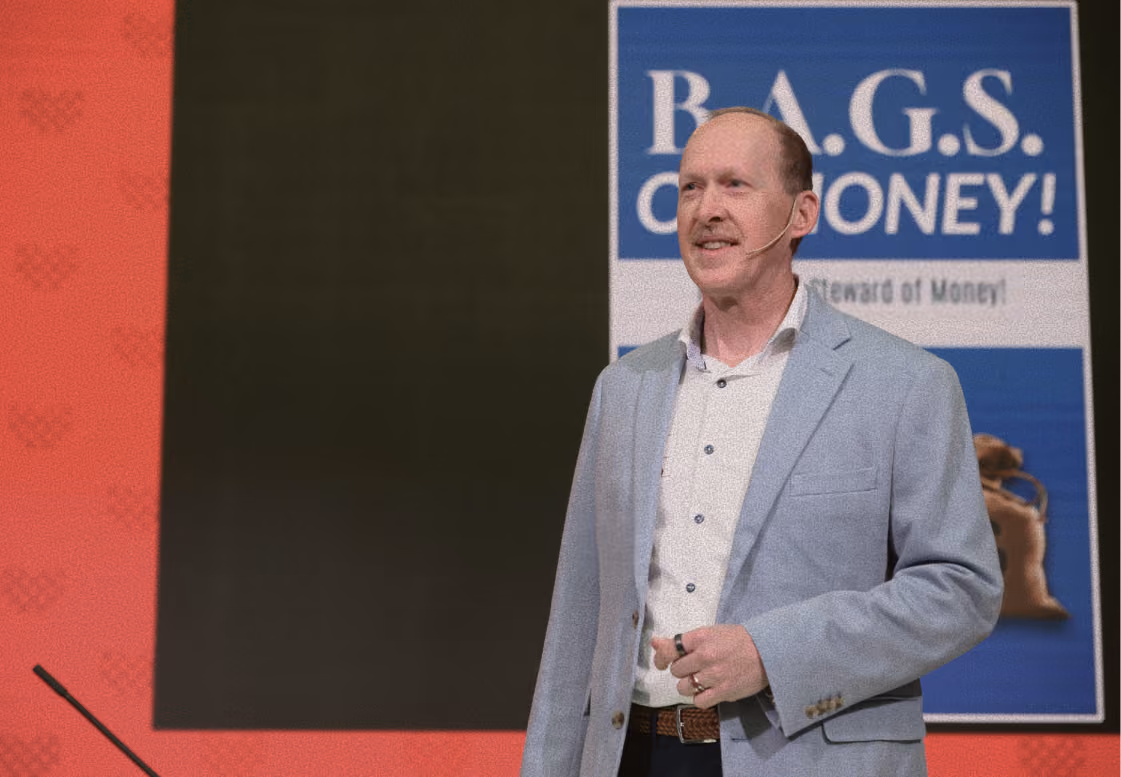 Jim Rasmussen speaking at a conference