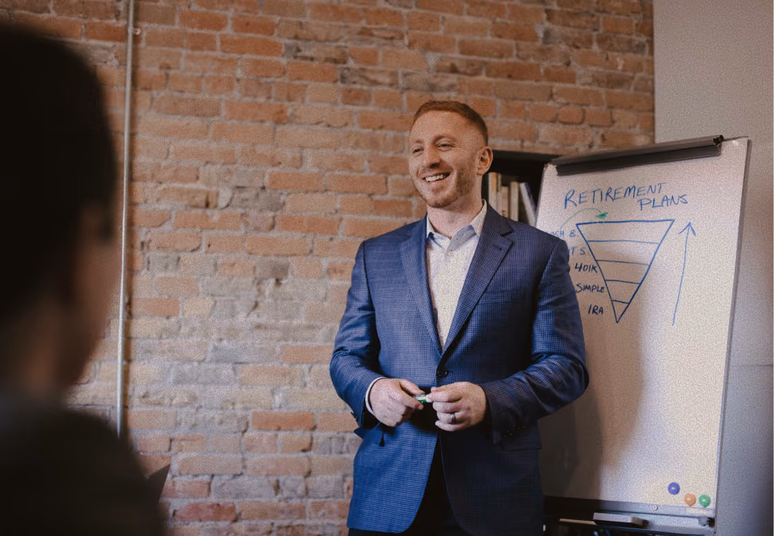 Daniel leading a team meeting