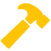 Yellow hammer tool with a claw head on gray background.