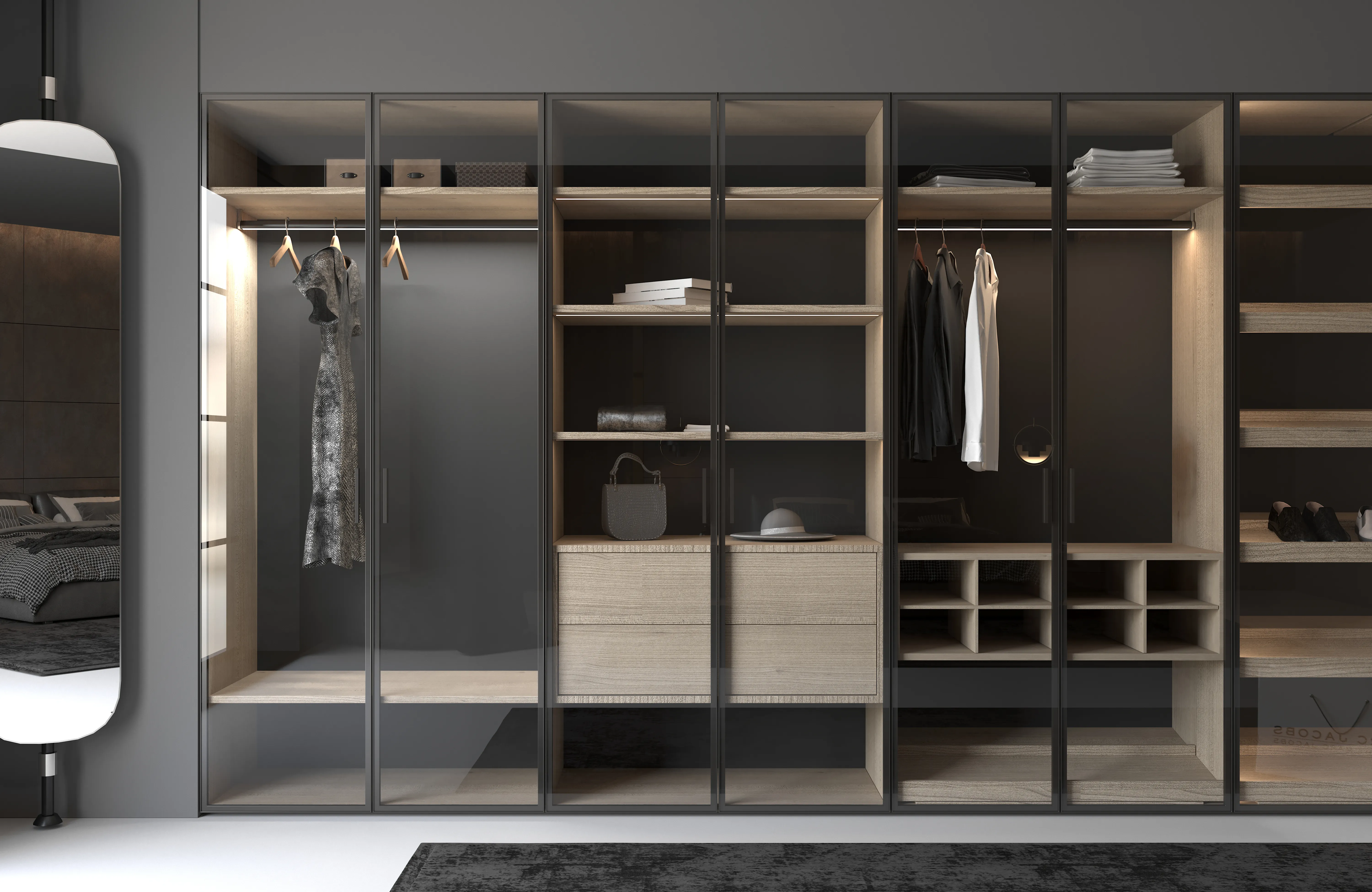 A glass-fronted master closet with backlit shelving displaying clothing and accessories like a curated wall.