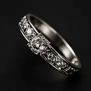 Detailed white gold ring with diamond centerpiece and intricate band design on dark background