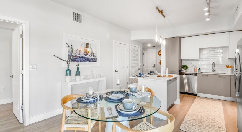 Kitchen and dining room with glass table 