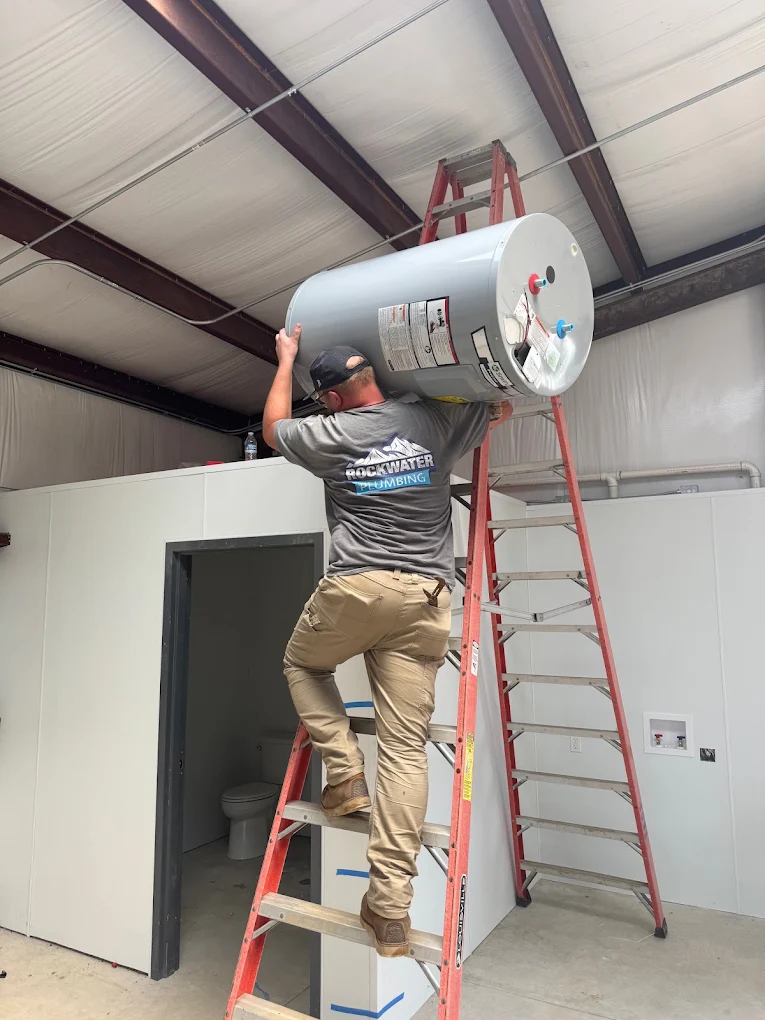 plumber replacing a water heater
