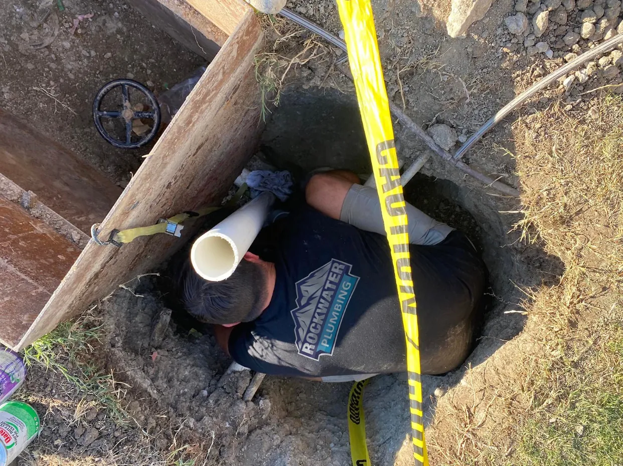 plumber installing a drain