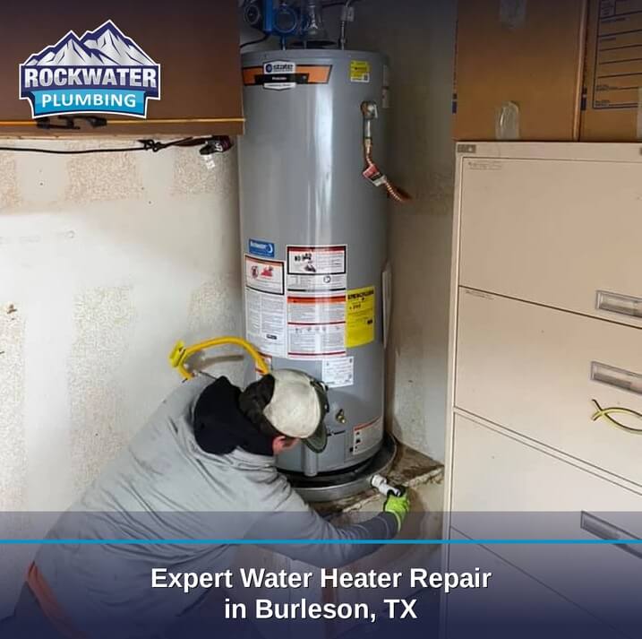 plumber repairing a water heater unit