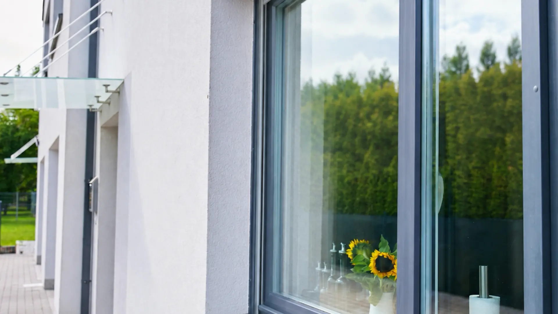 Home window with no exterior shutter, before installing a rolling security shutter