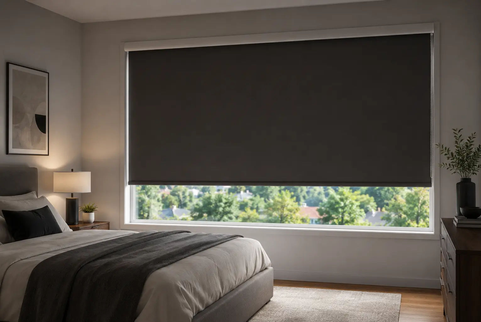 Dark blackout roller shade on a large bedroom window