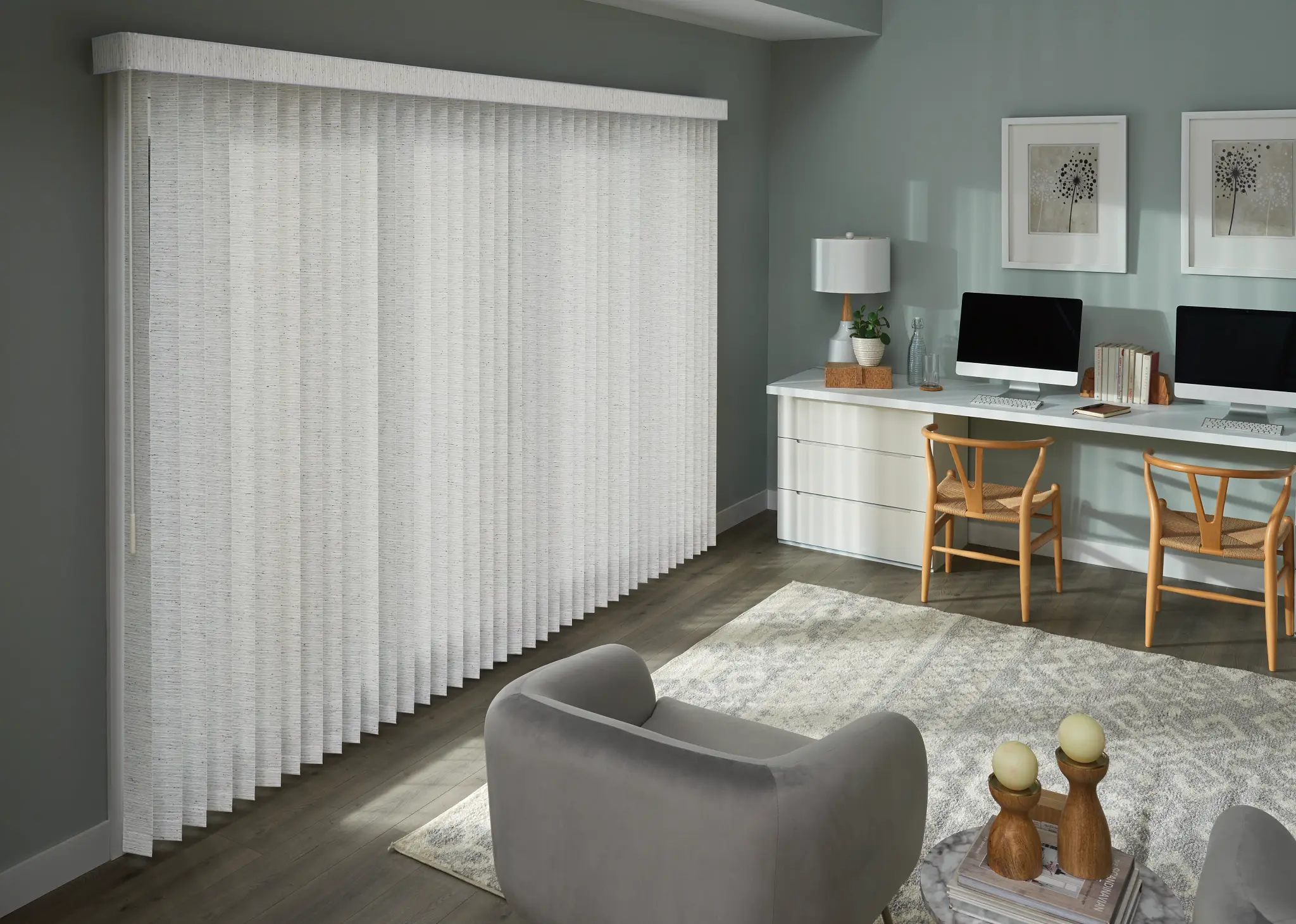 White textured vertical blinds on a patio door in a home office