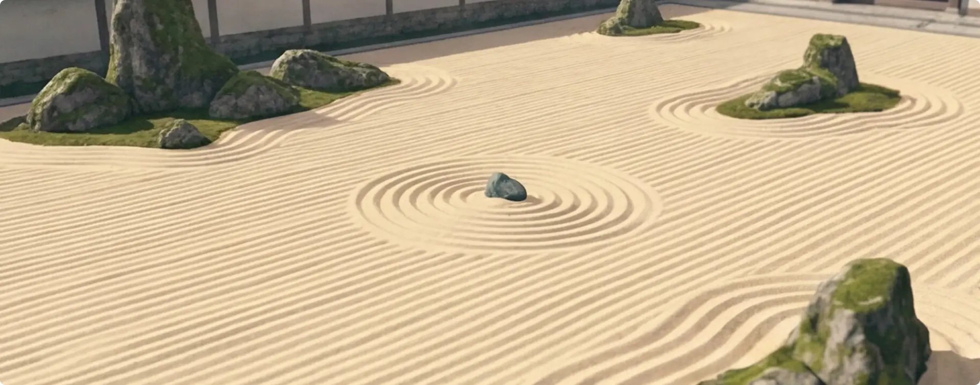 Zen garden with raked sand patterns around moss-covered rocks and a single stone in center circle.