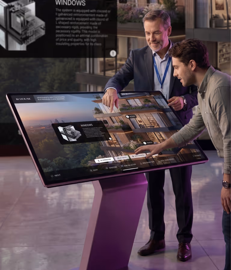 A real estate agent and a customer interacting with a large touch screen presentation kiosk, showcasing a 3D architectural facade visualization of the D House residential development with open window technical specs
