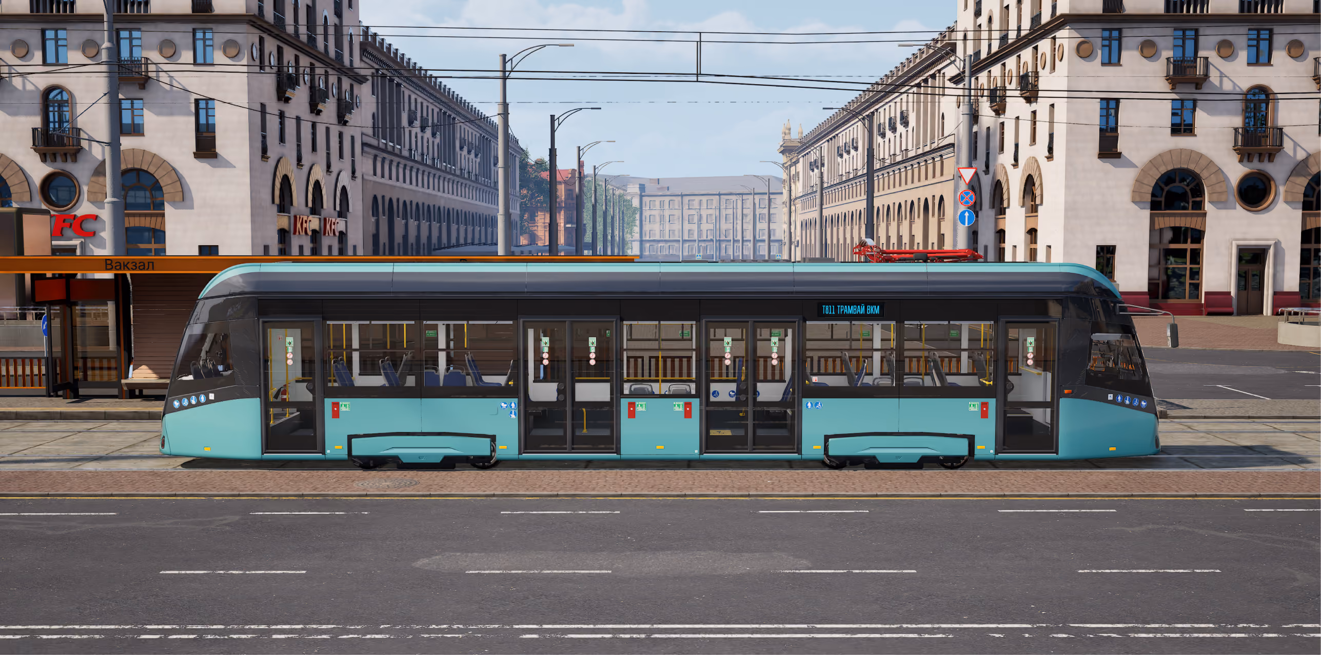 Turquoise tram on a city street beside a station stop, shown from the side.