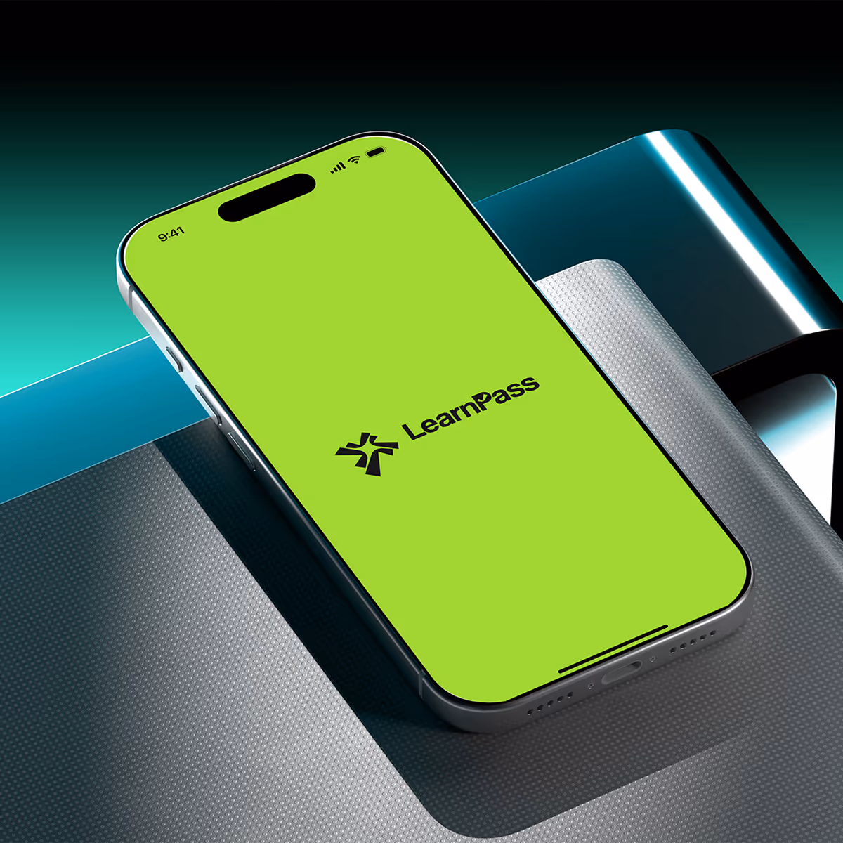 Smartphone with bright green screen displaying LearnPass logo resting on textured surface.