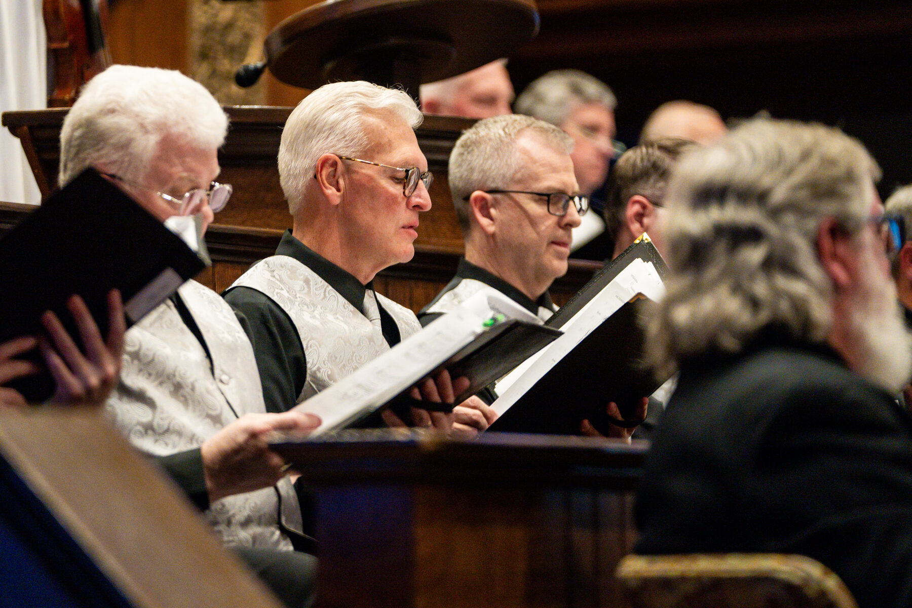 Heritage Choir members reading music