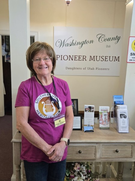Marlene McMullen volunteering at the Daughters of Utah Pioneers museum