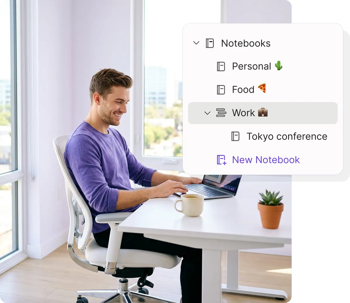 Smiling man in purple sweater working on a laptop at a white desk with a coffee mug and potted plant near large windows.