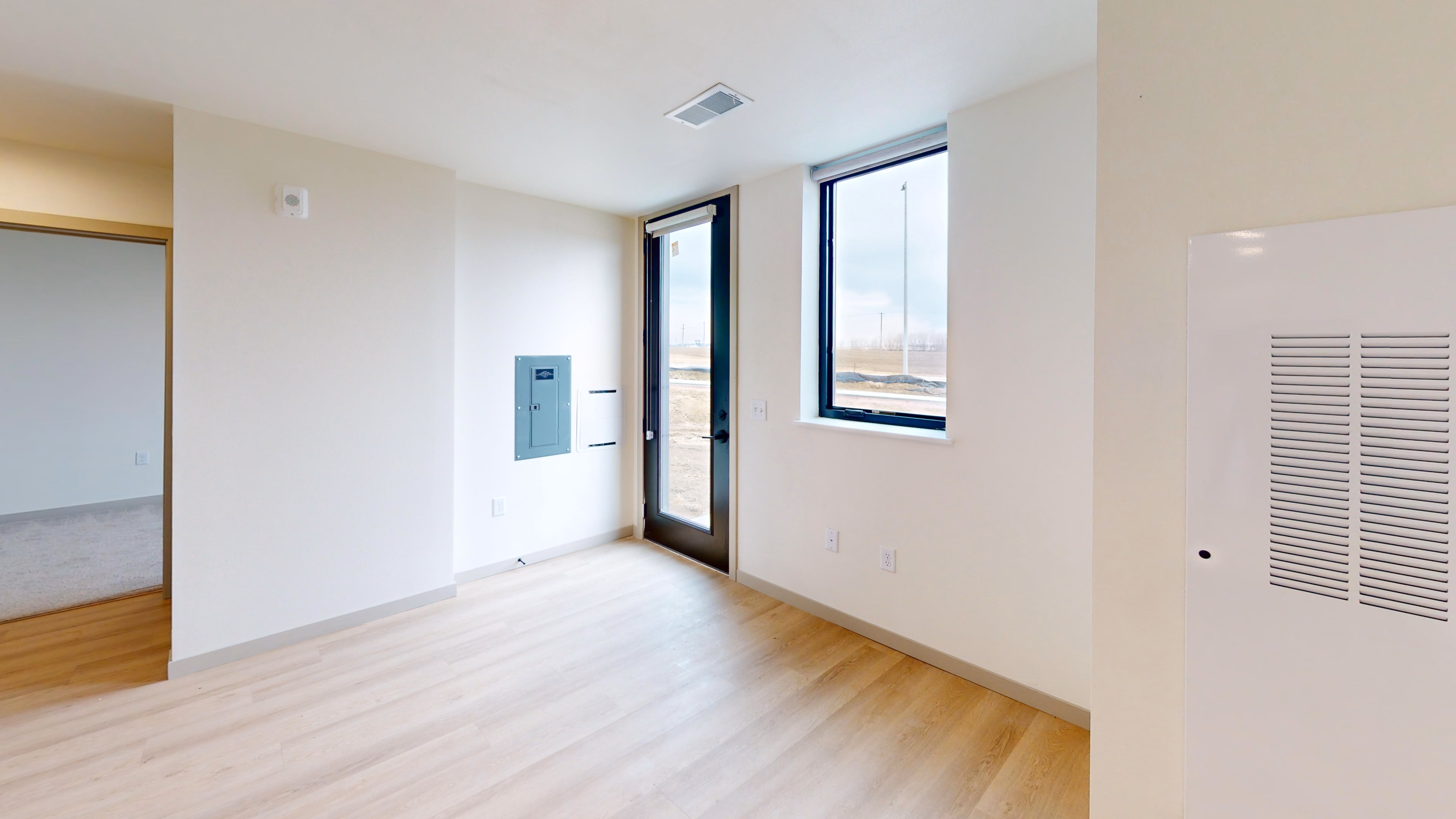 Open-concept living and dining area at Foss Fields Ascent