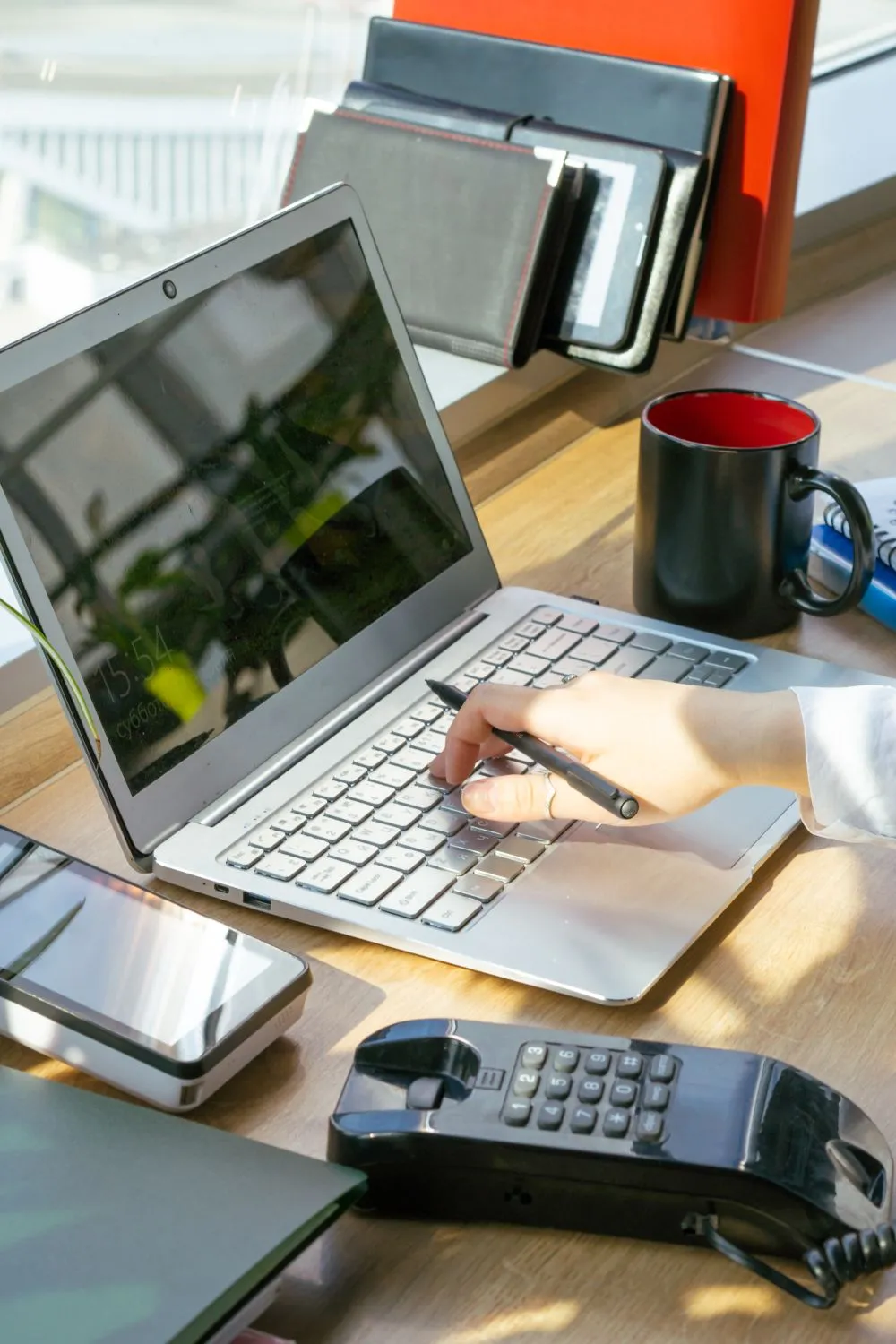 Office phone use illustrating DFW Vonage Business support