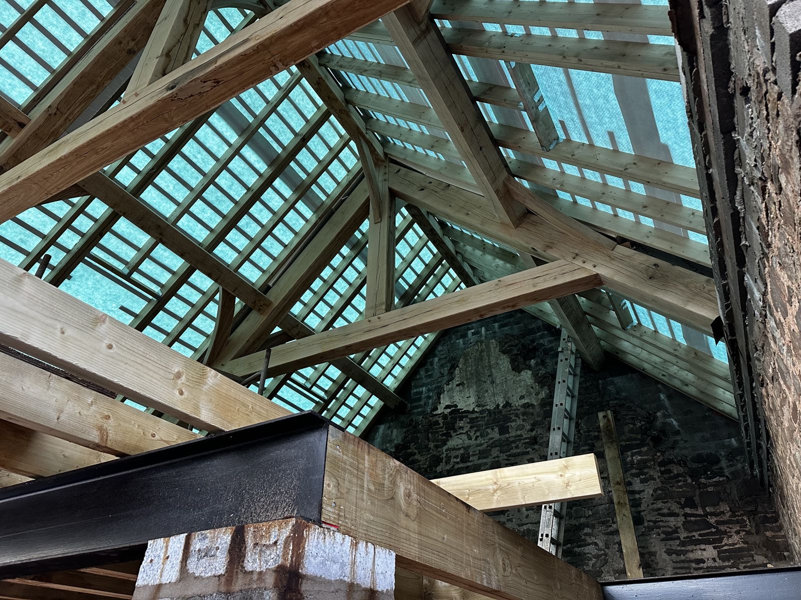 The oak roof structure inside the barn next to the workshop, before the roof is finished
