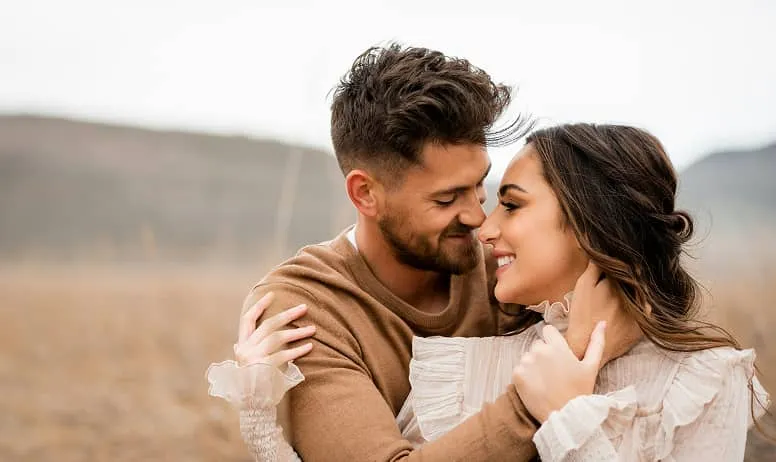Happy couple enjoying a moment of connection in nature