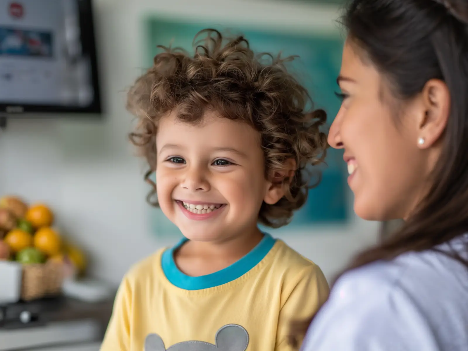 Doctor smiling with a young patient