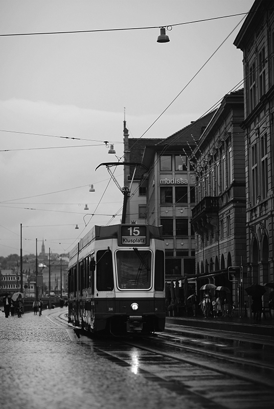 Zurich tram in the rain — Gunia Consulting footer image