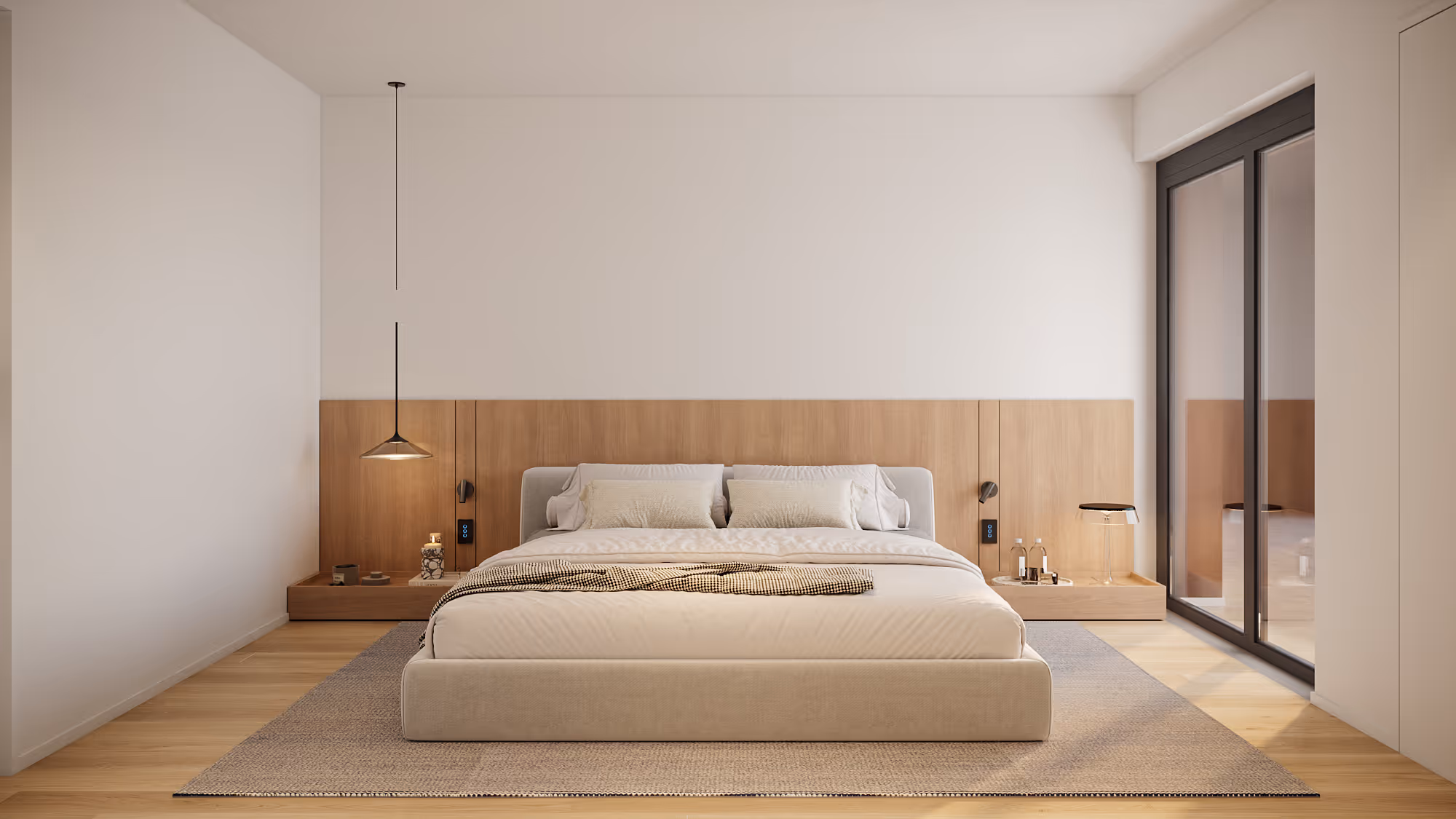 Schlafzimmer mit Doppelbett, eichentäfelter Kopfteilwand, Pendelleuchten und gewebtem Teppich auf Eichenparkett