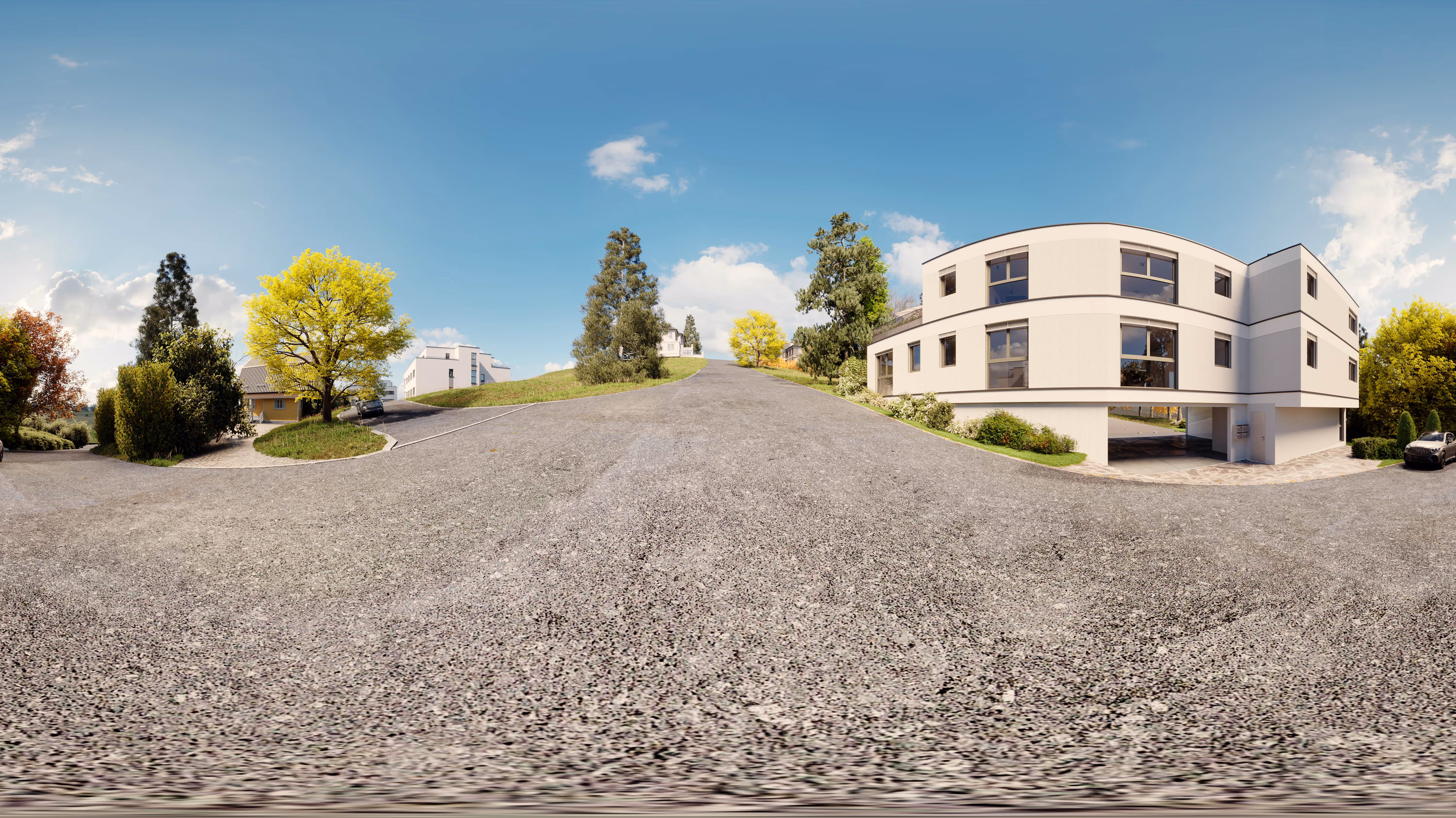 360-degree panorama of the residential building exterior with gravel driveway, landscaped garden and trees under a blue sky