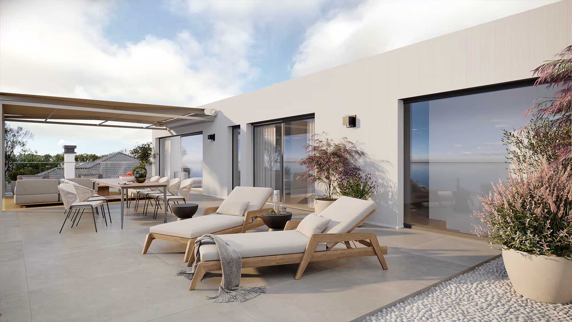 Modern patio with two lounge chairs, dining table, sofa, and potted plants under a retractable awning.