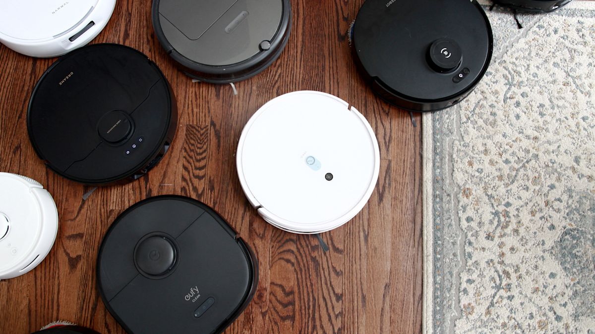 Robot vacuum cleaning a living room floor
