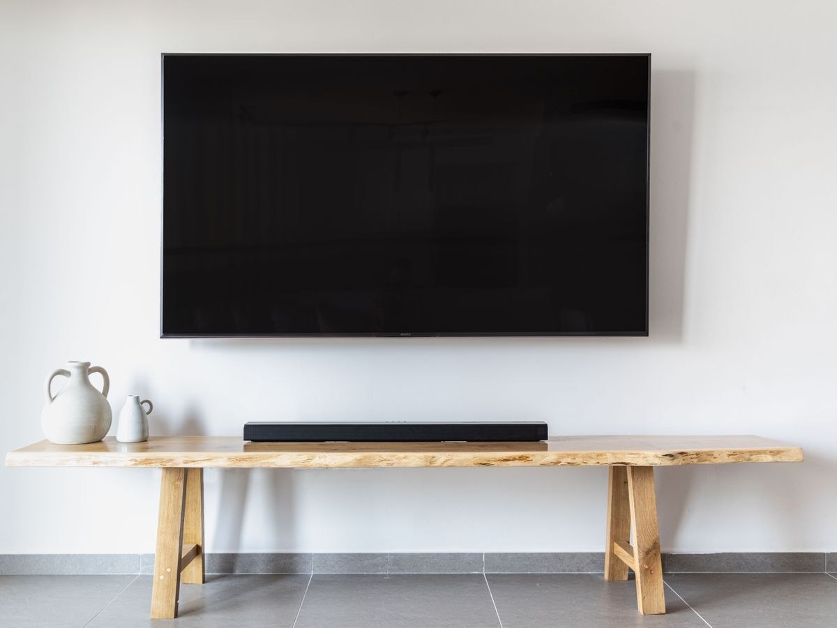 TV mounting — flat screen mounted cleanly on a living room wall