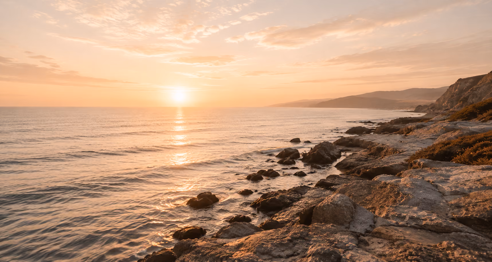 Ocean sunrise symbolizing a fresh coaching journey.
