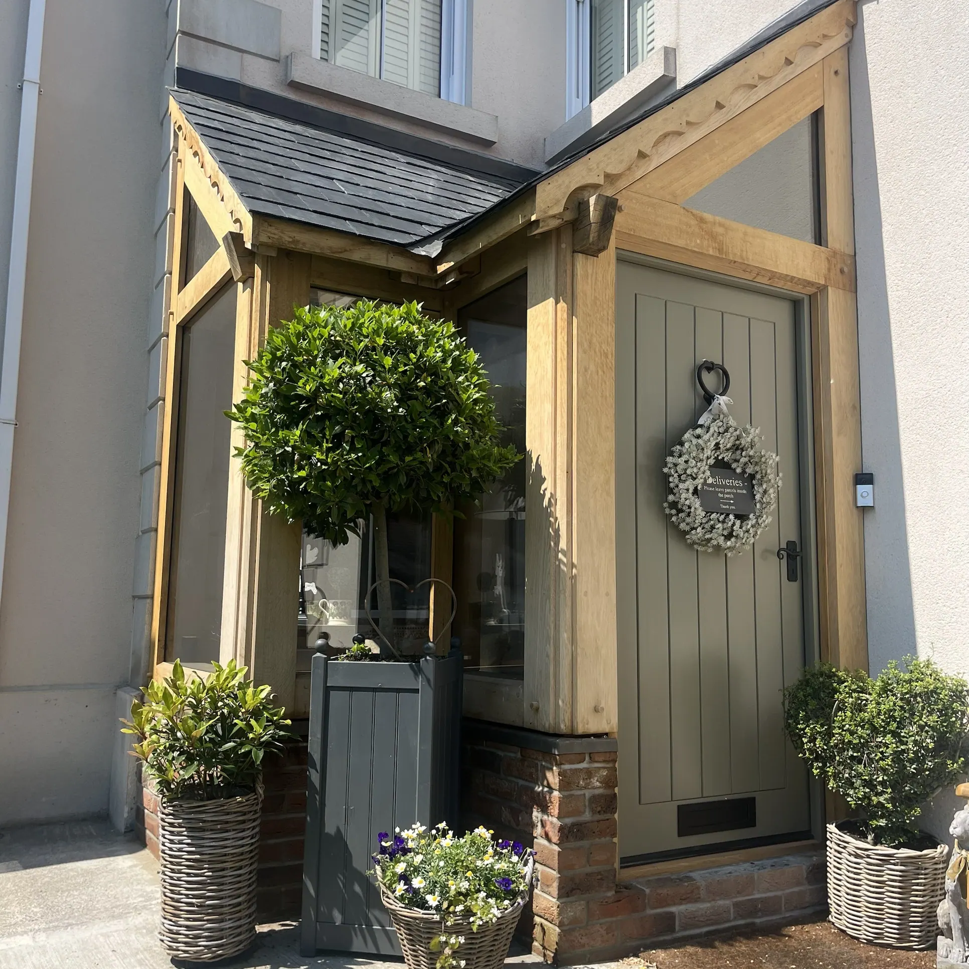 Oak frame corner porch at Llandybie